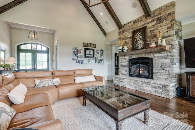 109 Oak Forest Dr, Kings Mountain, NC 28086 - living area with high vaulted ceiling, wood finished floors, a fireplace, beamed ceiling, and ornamental molding