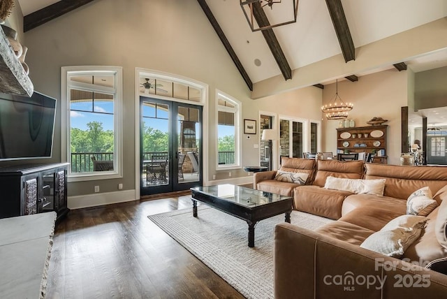 109 Oak Forest Dr, Kings Mountain, NC 28086 - living area with a chandelier, high vaulted ceiling, beam ceiling, wood finished floors, and baseboards