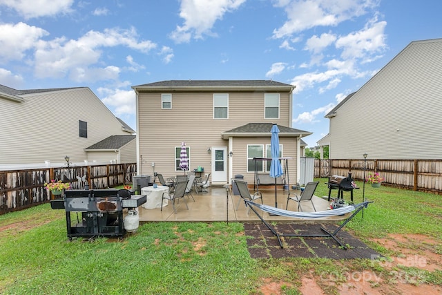 189 Fesperman Cir, Troutman, NC 28166 - back of property with a patio area and central air condition unit