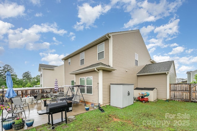 189 Fesperman Cir, Troutman, NC 28166 - rear view of property with a patio area and a shed
