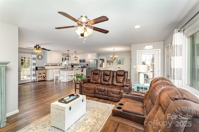 240 China Grove Rd, China Grove, NC 28123 - living room featuring a ceiling fan, recessed lighting, dark wood-style floors, and a chandelier