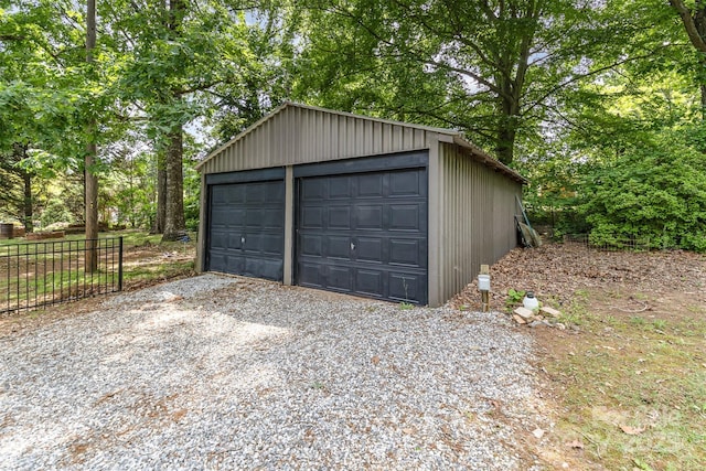 240 China Grove Rd, China Grove, NC 28123 - detached garage featuring view of wooded area