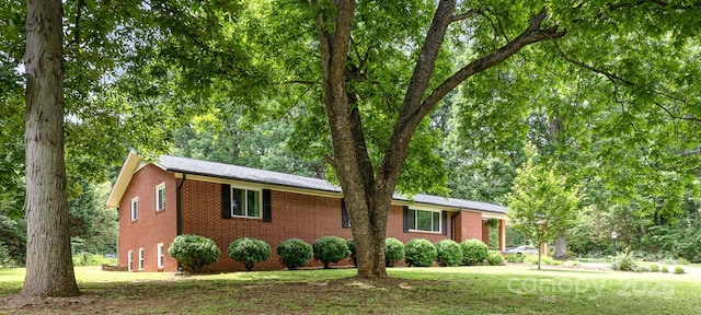 240 China Grove Rd, China Grove, NC 28123 - single story home with brick siding and a front lawn