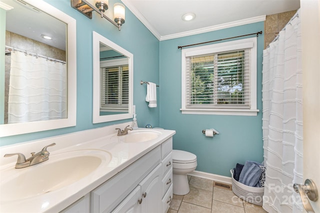 240 China Grove Rd, China Grove, NC 28123 - bathroom featuring double vanity, toilet, tile patterned floors, ornamental molding, and baseboards