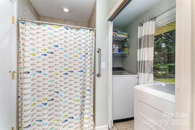 240 China Grove Rd, China Grove, NC 28123 - bathroom with washer / dryer, a shower with curtain, and tile patterned floors