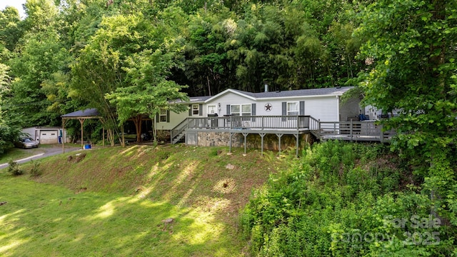 5366 Hayes Waters Rd, Morganton, NC 28655 - rear view of property with a deck, a lawn, and stairs