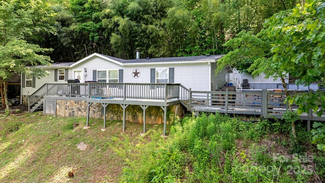5366 Hayes Waters Rd, Morganton, NC 28655 - rear view of property featuring a wooden deck and stairs
