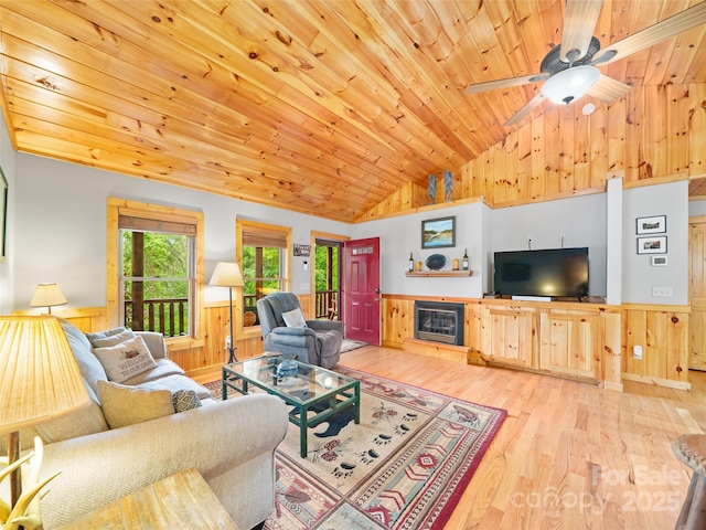198 Bear Ridge Rd, Bakersville, NC 28705 - living area featuring vaulted ceiling, wainscoting, wooden ceiling, wooden walls, and wood finished floors