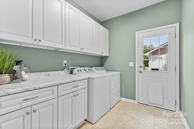 10027 Juniper Trace Dr, Charlotte, NC 28277 - laundry area with cabinet space, washer and dryer, baseboards, and light tile patterned flooring