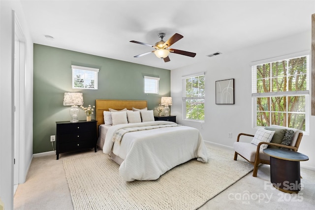 10027 Juniper Trace Dr, Charlotte, NC 28277 - bedroom featuring light carpet, baseboards, and a ceiling fan