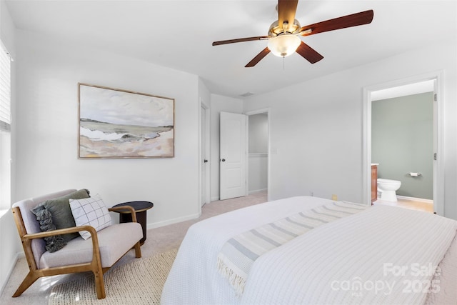 10027 Juniper Trace Dr, Charlotte, NC 28277 - bedroom with light colored carpet, baseboards, connected bathroom, and a ceiling fan