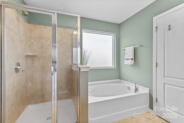 10027 Juniper Trace Dr, Charlotte, NC 28277 - bathroom featuring a shower stall and a bath
