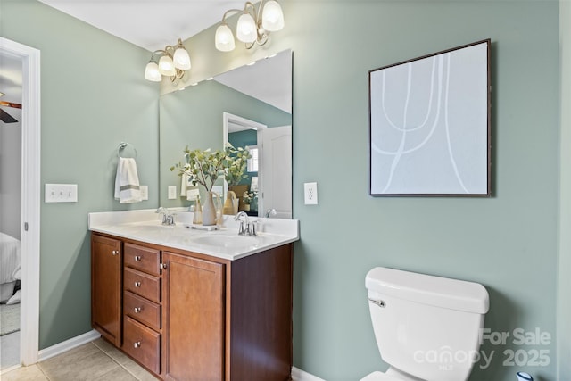 10027 Juniper Trace Dr, Charlotte, NC 28277 - full bath with double vanity, connected bathroom, toilet, and tile patterned floors