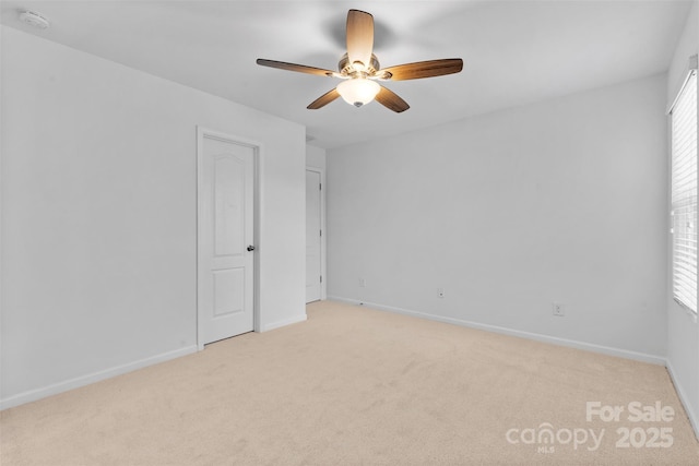 10027 Juniper Trace Dr, Charlotte, NC 28277 - unfurnished bedroom featuring light colored carpet, baseboards, and ceiling fan