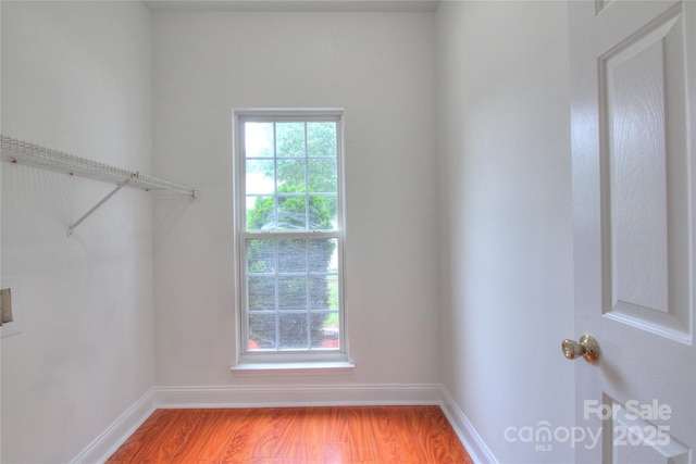 6310 Trevor Simpson Dr, Indian Trail, NC 28079 - spacious closet featuring light wood finished floors