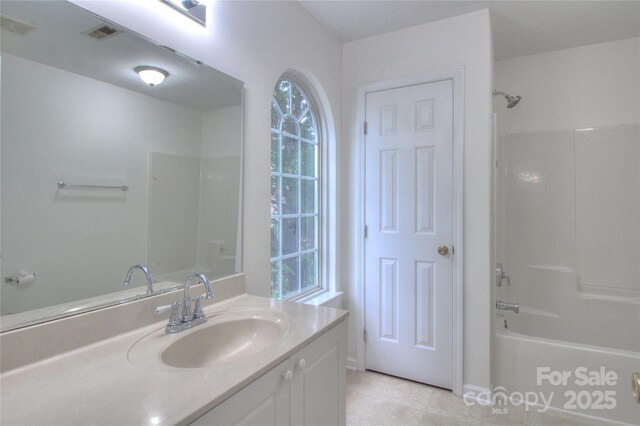 6310 Trevor Simpson Dr, Indian Trail, NC 28079 - full bath with vanity, bathing tub / shower combination, and tile patterned flooring
