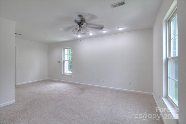 6310 Trevor Simpson Dr, Indian Trail, NC 28079 - empty room with a ceiling fan, carpet floors, and baseboards