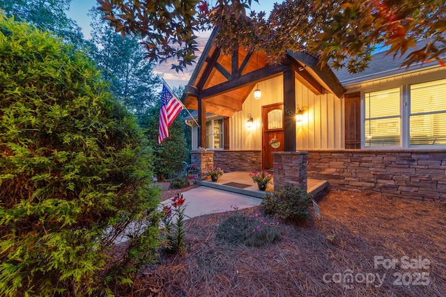 560 Blue Sky Dr, Dallas, NC 28034 - view of front facade featuring board and batten siding and stone siding