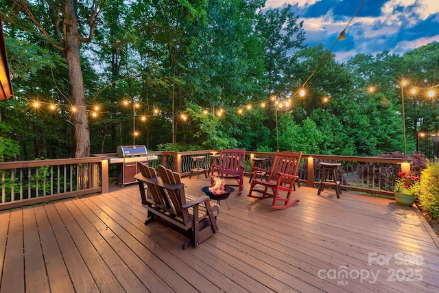 560 Blue Sky Dr, Dallas, NC 28034 - deck with a fire pit and area for grilling