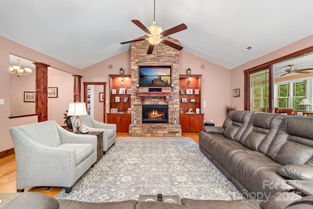 560 Blue Sky Dr, Dallas, NC 28034 - living room with ceiling fan, light wood-style flooring, ornate columns, lofted ceiling, and a fireplace