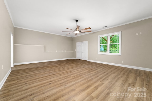 560 Blue Sky Dr, Dallas, NC 28034 - spare room with baseboards, a ceiling fan, crown molding, and wood finished floors