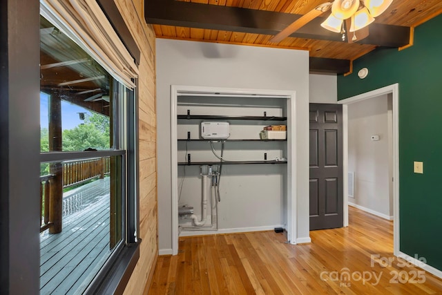 111 Grizzly Den Way, Marion, NC 28752 - unfurnished bedroom featuring wood ceiling with exposed beams, wood finished floors, baseboards, and a closet