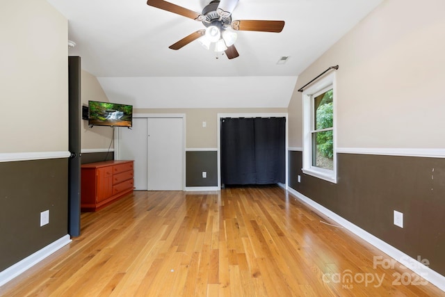 111 Grizzly Den Way, Marion, NC 28752 - unfurnished bedroom featuring light wood-style floors, baseboards, and ceiling fan