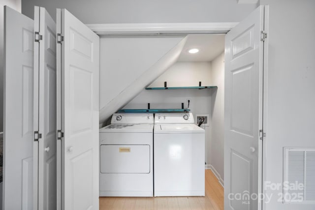 111 Grizzly Den Way, Marion, NC 28752 - laundry room featuring light wood-type flooring, washing machine and clothes dryer, baseboards, and recessed lighting