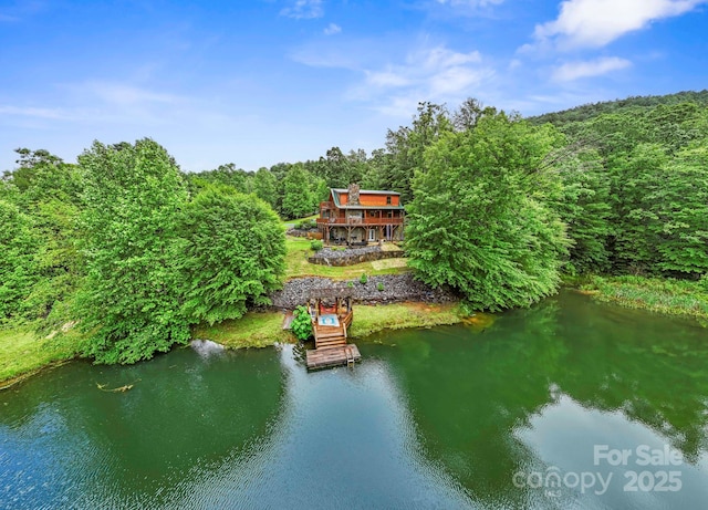 111 Grizzly Den Way, Marion, NC 28752 - view from above of property featuring a nearby body of water and a heavily wooded area