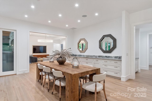 3020 Brooks Mill Ln, Wingate, NC 28174 - dining space featuring light wood finished floors, recessed lighting, and baseboards