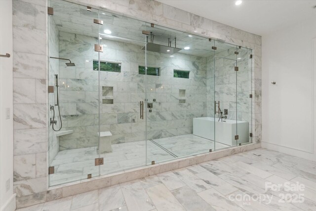 3020 Brooks Mill Ln, Wingate, NC 28174 - bathroom featuring a bath, marble finish floors, a marble finish shower, baseboards, and recessed lighting