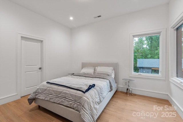 3020 Brooks Mill Ln, Wingate, NC 28174 - bedroom featuring light wood-style flooring and recessed lighting