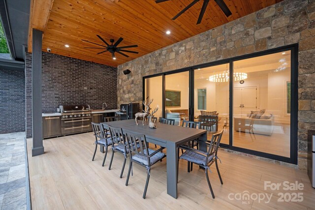 3020 Brooks Mill Ln, Wingate, NC 28174 - view of patio / terrace with a ceiling fan, outdoor dining space, and a sink