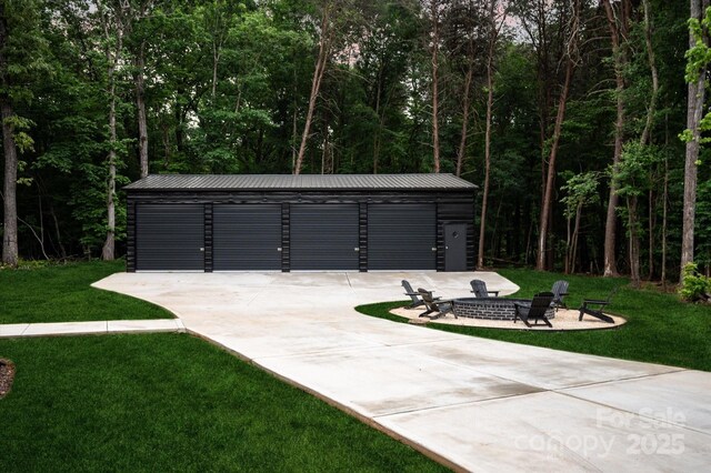 3020 Brooks Mill Ln, Wingate, NC 28174 - detached garage with a forest view