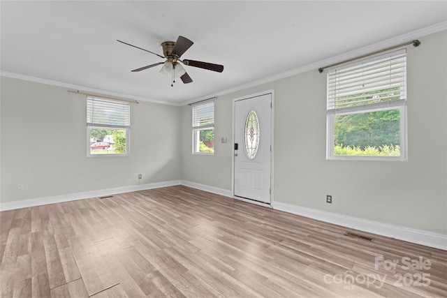 3400 Reid Ave, Charlotte, NC 28208 - foyer entrance with ornamental molding, light wood-style flooring, baseboards, and ceiling fan