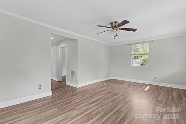 3400 Reid Ave, Charlotte, NC 28208 - empty room featuring wood finished floors, ceiling fan, baseboards, and crown molding