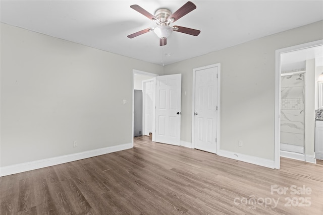 3400 Reid Ave, Charlotte, NC 28208 - unfurnished bedroom featuring wood finished floors, baseboards, ensuite bath, and a ceiling fan