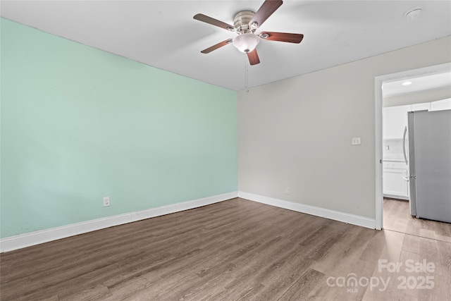 3400 Reid Ave, Charlotte, NC 28208 - empty room featuring ceiling fan, wood finished floors, and baseboards