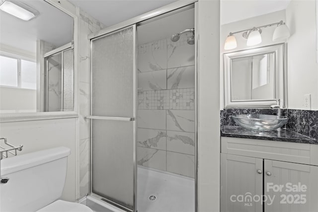 3400 Reid Ave, Charlotte, NC 28208 - bathroom featuring a shower stall, toilet, and vanity