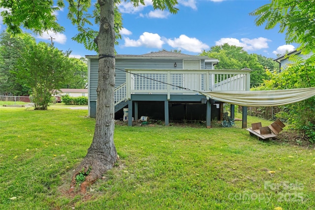 3400 Reid Ave, Charlotte, NC 28208 - back of property with a wooden deck, a yard, and stairs