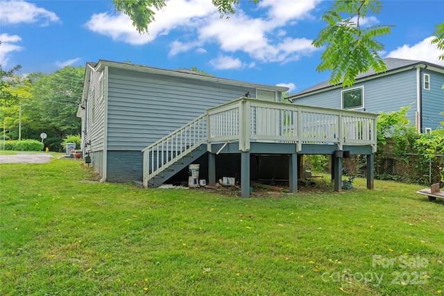 3400 Reid Ave, Charlotte, NC 28208 - rear view of property featuring a wooden deck, a lawn, and stairs