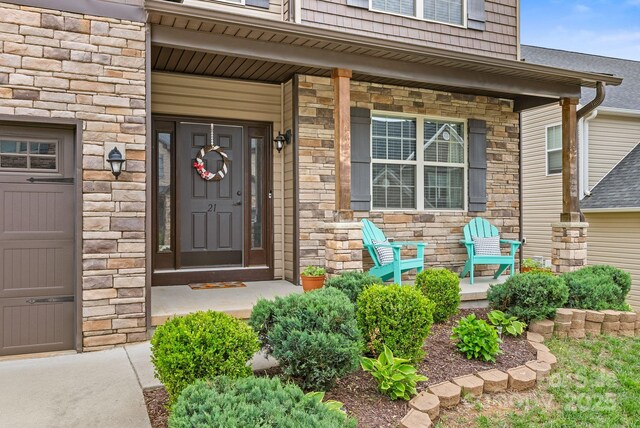 21 Henbit Way, Arden, NC 28704 - entrance to property with stone siding and covered porch
