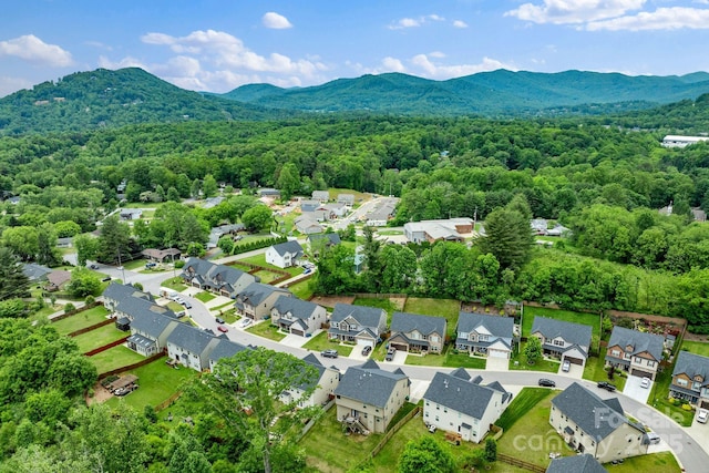 21 Henbit Way, Arden, NC 28704 - aerial perspective of suburban area with a mountainous background and a forest