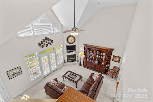 1070 Blueberry Rd, Salisbury, NC 28147 - living area with high vaulted ceiling, healthy amount of natural light, carpet, a ceiling fan, and baseboards