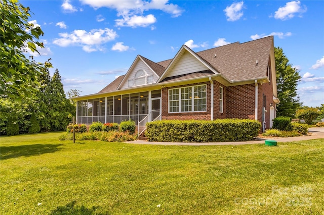 1070 Blueberry Rd, Salisbury, NC 28147 - rear view of property with a sunroom, brick siding, a lawn, and roof with shingles