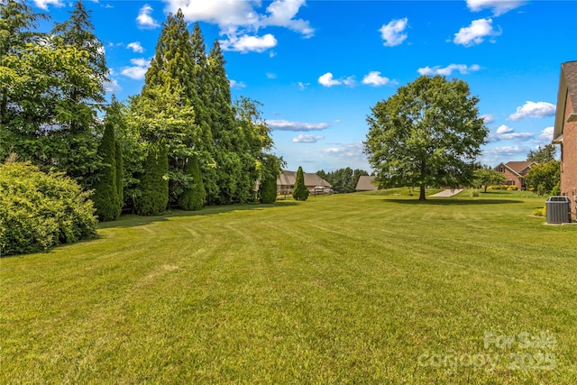 1070 Blueberry Rd, Salisbury, NC 28147 - view of grassy yard featuring central AC unit