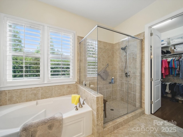 1004 Fairbanks Ct, Indian Trail, NC 28079 - bathroom with a bath, a shower stall, and a spacious closet