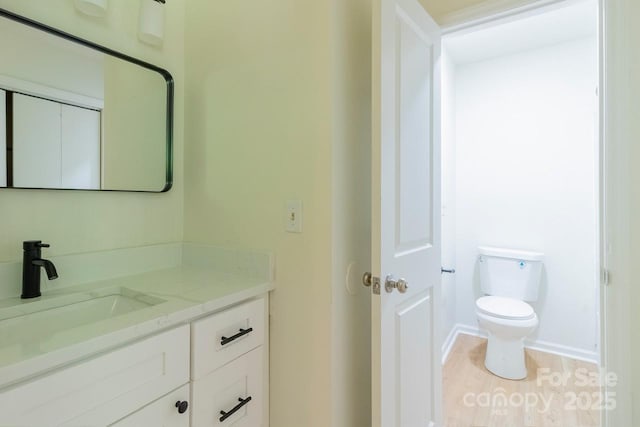 5233 Great Wagon Rd, Charlotte, NC 28215 - bathroom featuring vanity, toilet, and baseboards