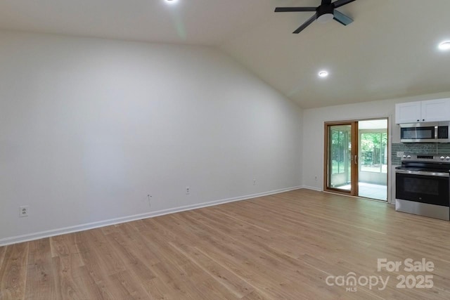 5233 Great Wagon Rd, Charlotte, NC 28215 - unfurnished living room featuring ceiling fan, vaulted ceiling, light wood-type flooring, baseboards, and recessed lighting