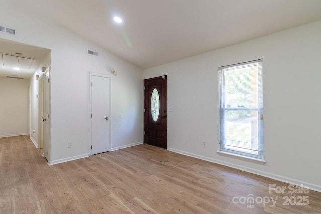 5233 Great Wagon Rd, Charlotte, NC 28215 - foyer featuring light wood-type flooring, lofted ceiling, and baseboards